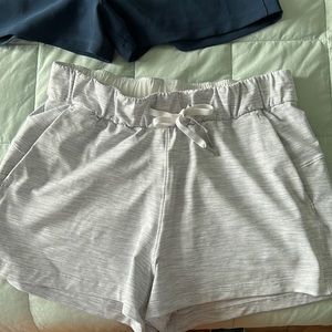 Lululemon shorts. Size 6. Thin horizontal gray and white stripes. Only worn 2x.